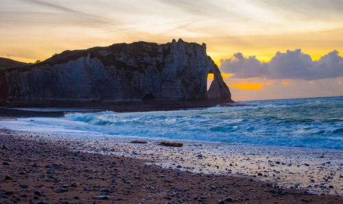 Scenic view of sea against sky during sunset