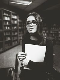 Close-up of woman wearing glasses