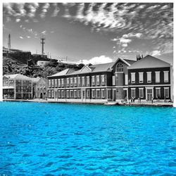 View of swimming pool against blue sky