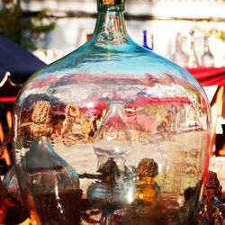 Close-up of glass bottles on table