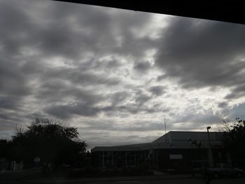 Building against cloudy sky