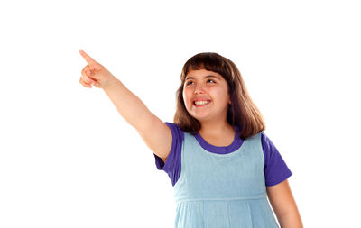 Portrait of a smiling young woman against white background