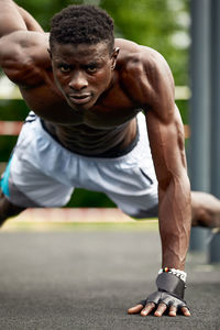 Man exercising on court