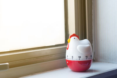 Close-up of toy car on window sill