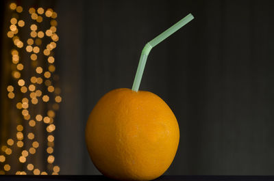 Close-up of apple against black background