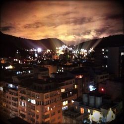 Illuminated cityscape at night