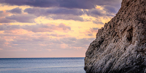 Scenic view of sea against sky at sunset