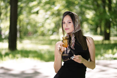 Portrait of a woman drinking glass