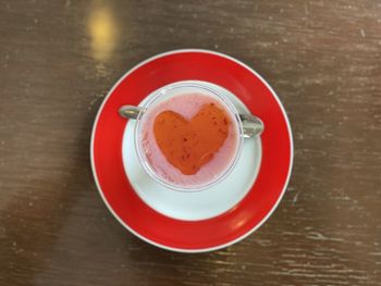 Directly above shot of coffee cup on table