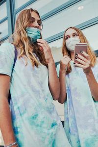 Young woman using mobile phone