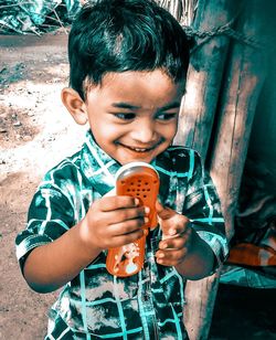 Portrait of cute boy drinking ice cream