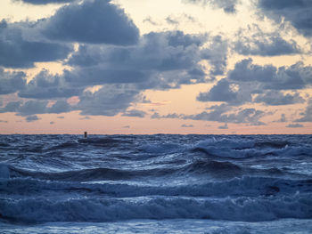 Scenic view of sea against sky during sunset