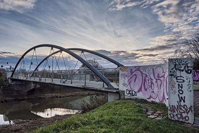 Bridge over river against sky