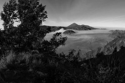 View of volcanic landscape against sky