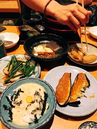 Midsection of woman having food