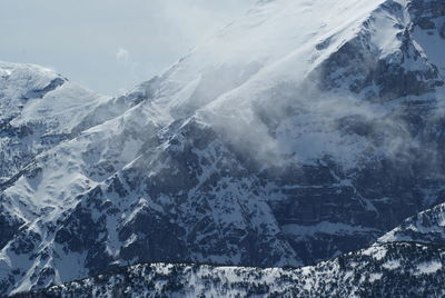 Scenic view of snow covered mountains