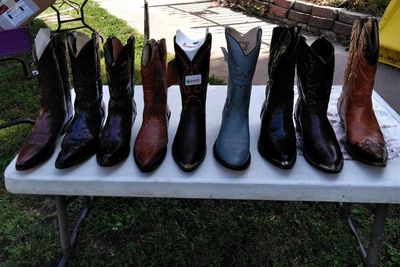 Low section of shoes hanging on rack