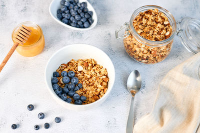 Homemade granola with nuts and fresh berries for breakfast. proper balanced nutrition. food for vege