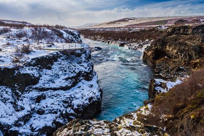 Scenic view of sea against sky during winter