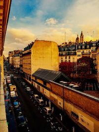 Buildings against sky at sunset