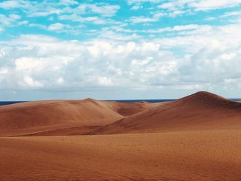 Scenic view of desert against sky