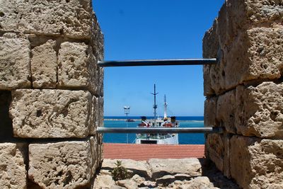 View of sea against clear blue sky