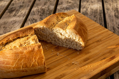 High angle view of bread on cutting board