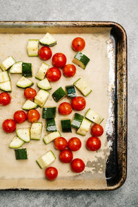 High angle view of chopped tomatoes on cutting board