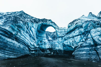 Scenic view of snow covered mountain against sky