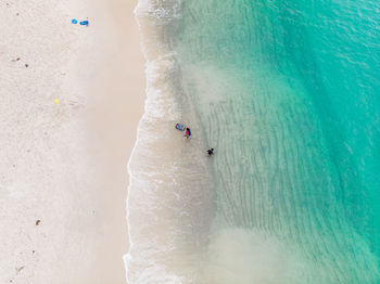 High angle view of people on sea shore