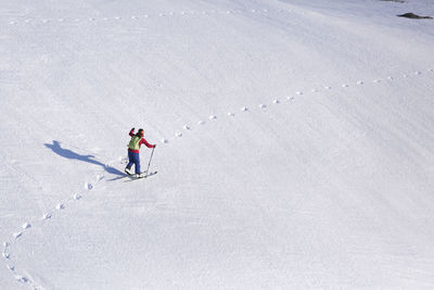 High angle view of man skiing in snow