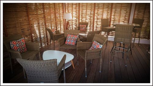 Empty chairs and table in basket