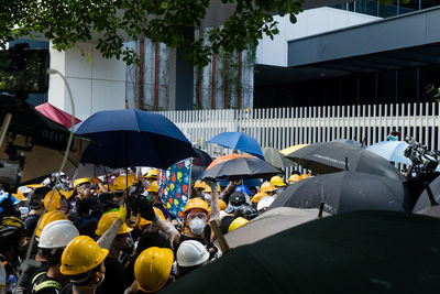 People on street in rain