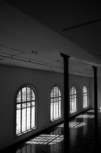 Low angle view of silhouette ceiling of building