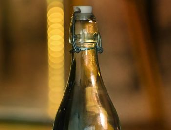 Close-up of beer bottle on table