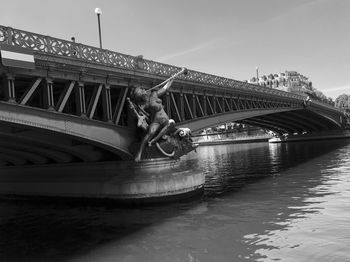 Bridge over river against sky