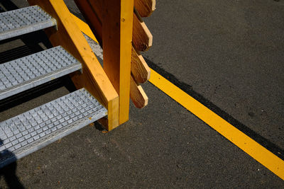 Yellow marking on road in sunlight