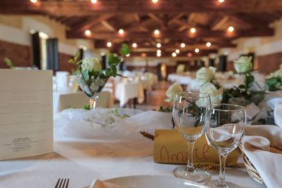 Flower vase on table in restaurant