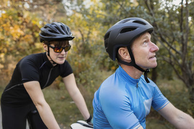 Man riding bicycle on land