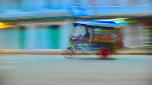 Blurred motion of car on street in city