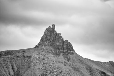 Rock formations on landscape against sky