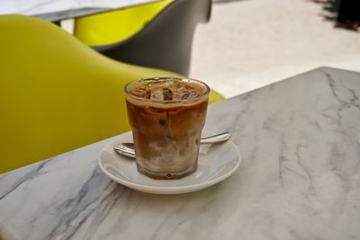 Close-up of coffee cup on table