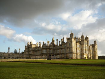 View of historical building against cloudy sky