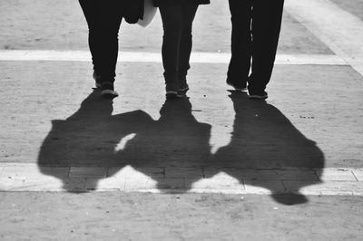 Low section of people standing on ground