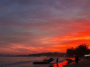 Scenic view of beach against sky during sunset