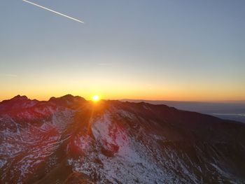 Scenic view of mountain against sky during sunset