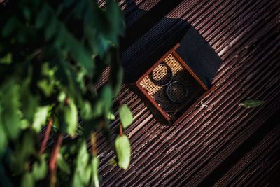 High angle view of cross on wood