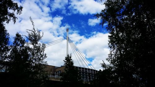 Low angle view of buildings against blue sky