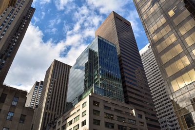 Low angle view of modern buildings against sky