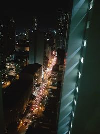 Illuminated cityscape at night